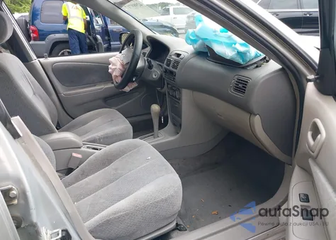 1999 Toyota Corolla Ce z USA, uszkodzony, nr VIN 2T1BR12E9XC180124